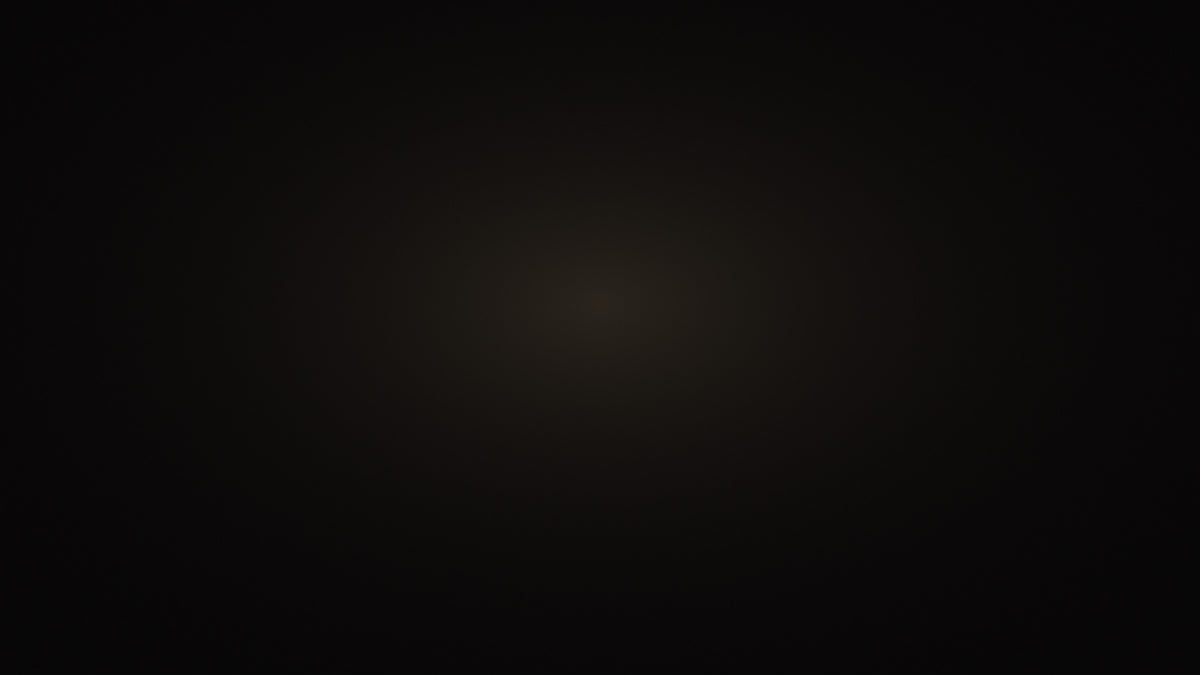 Black background with a soft champagne glow